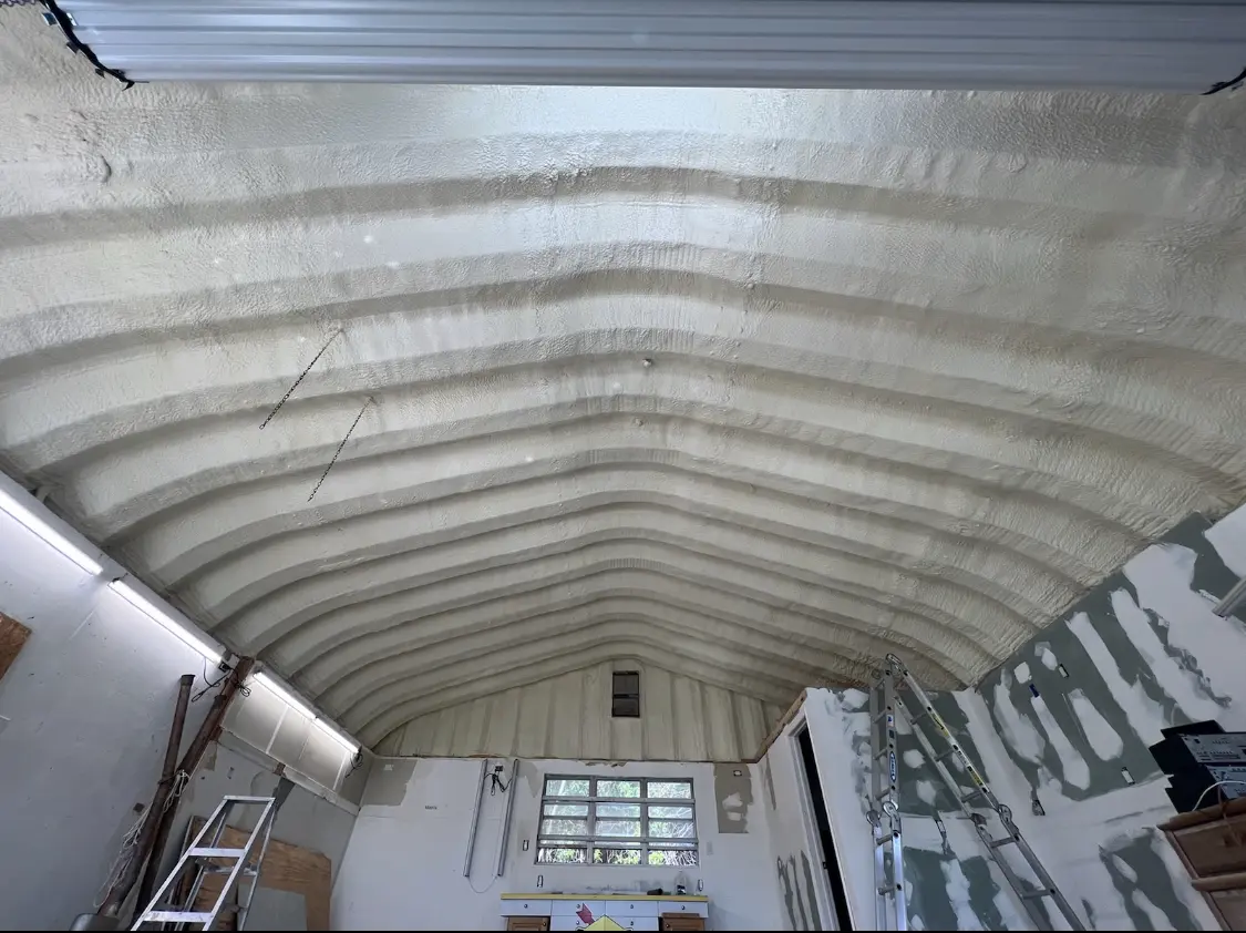 Spray polyurethane foam applied to the underside of a metal roof deck in Mahomet